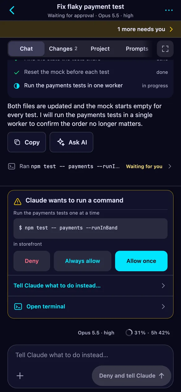 A session chat on the phone with a card asking to allow the command npm test.